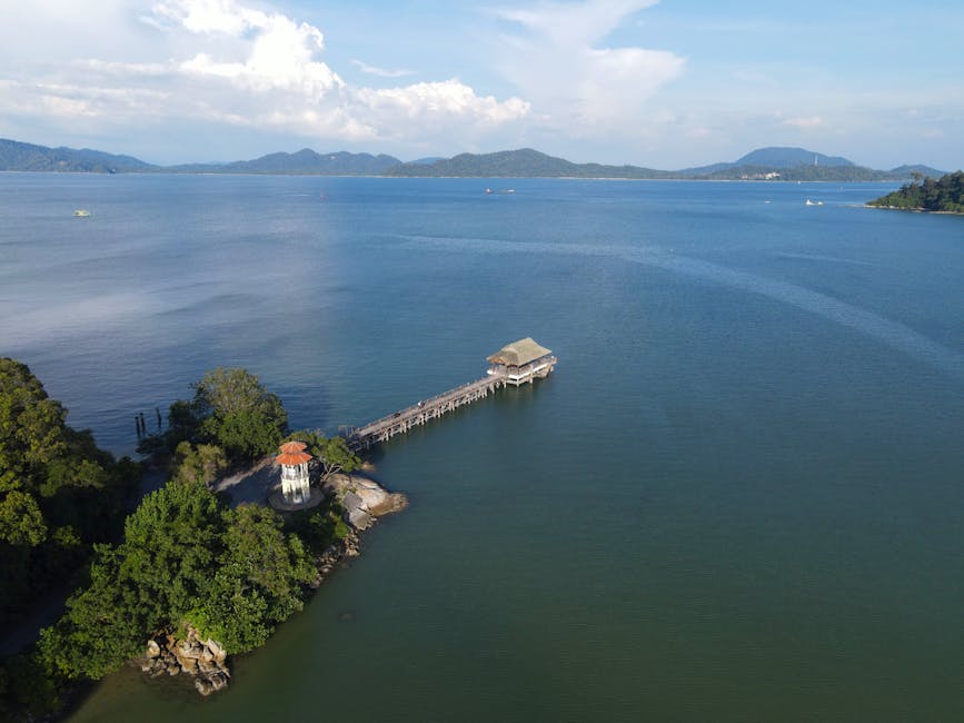 A stunning aerial view of the jetty at Pangkor Island, Malaysia, with serene ocean vistas.