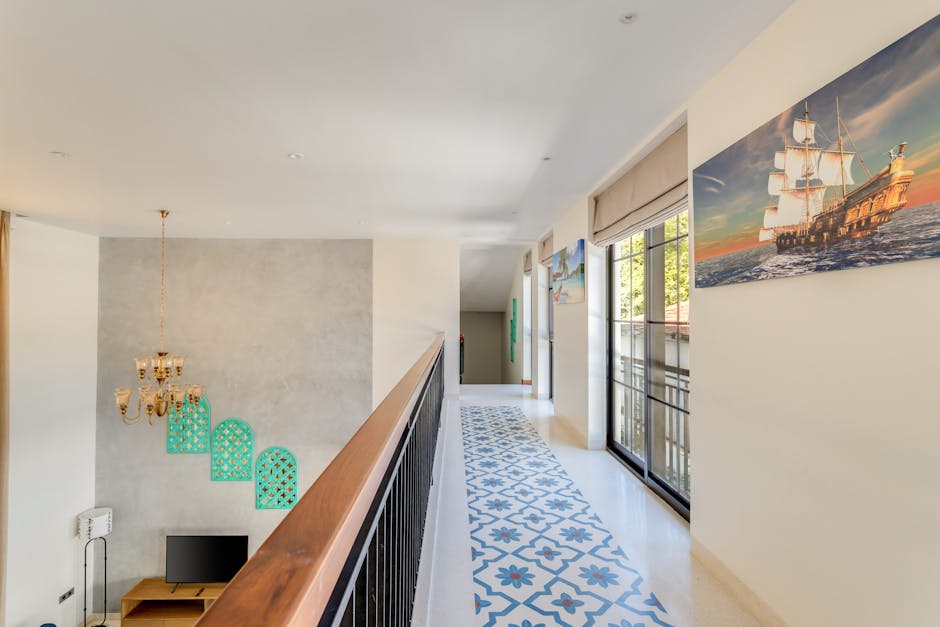 Spacious villa interior in Goa, India, featuring modern decor and nautical artwork for a luxurious ambiance.