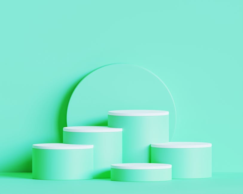 Clean and modern green podiums arranged for product display against a pastel background.