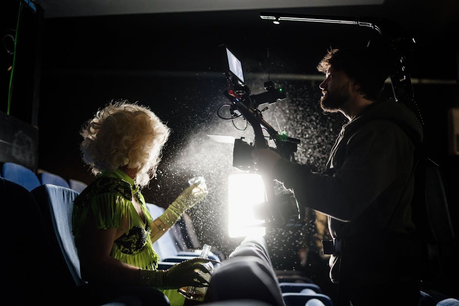 Rene filmmaker on set with camera gear