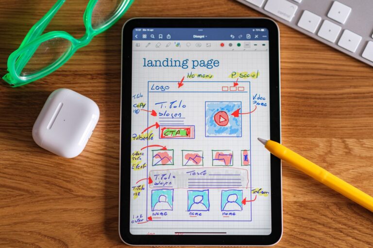 Business team planning landing page CRO checklist project on a laptop