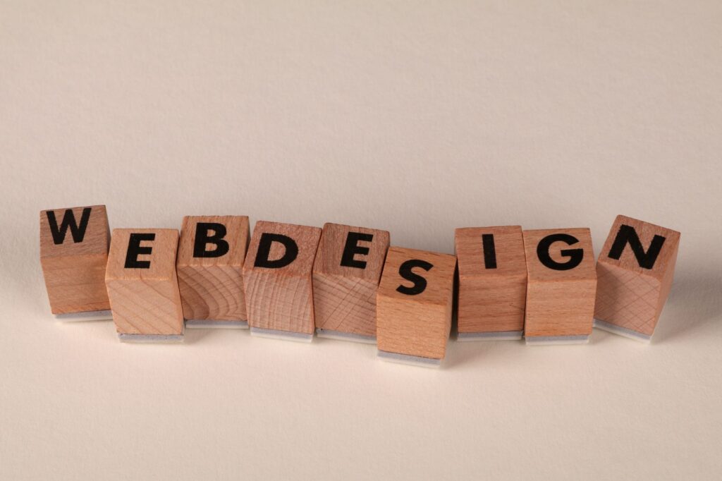 Business team planning free image licensing WordPress project on a laptop