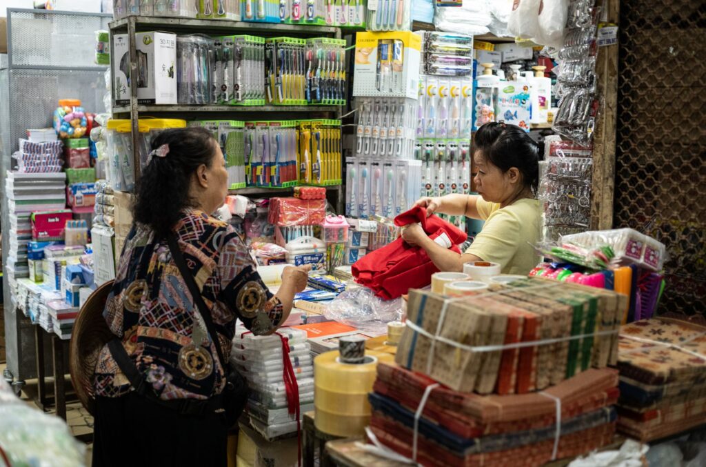 Southeast Asian ecommerce operations team managing multi-platform catalog